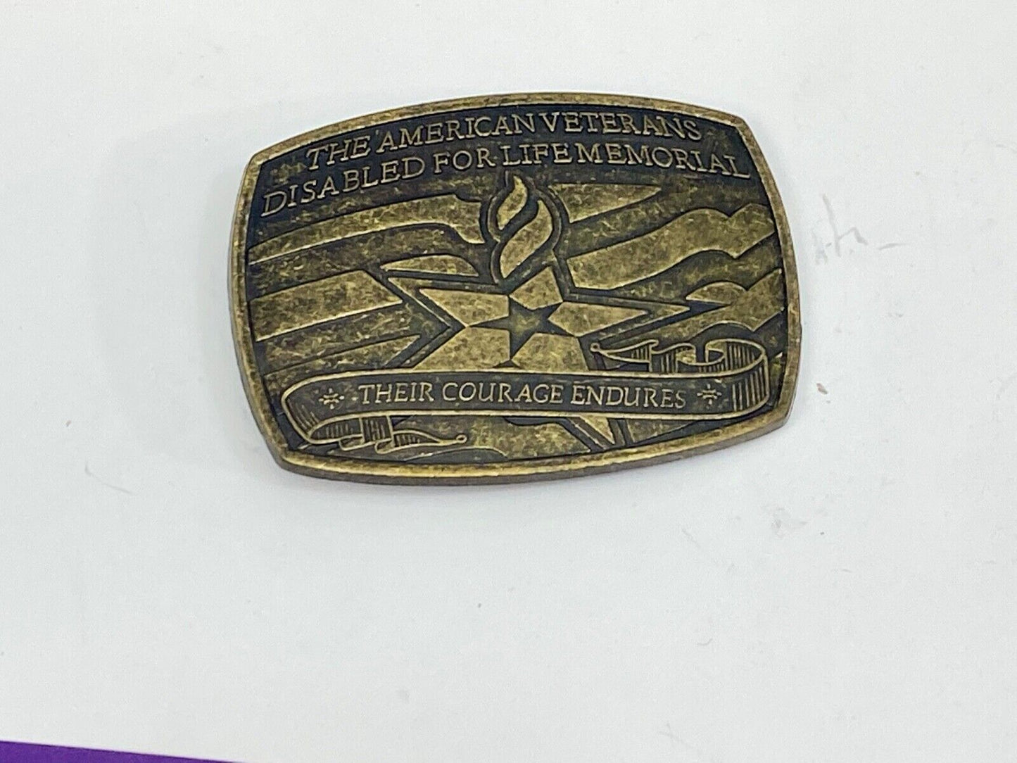 The American Disable Veteran Memorial Belt Buckle Their Courage Endures.