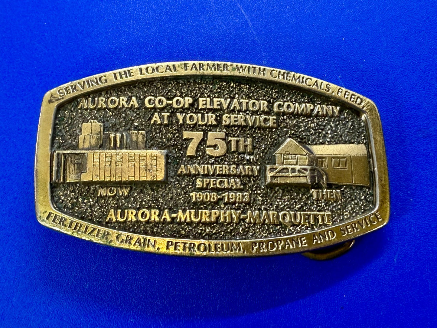 Aurora Co-Op Elevator Company at your Service 75th Anniversary Belt Buckle