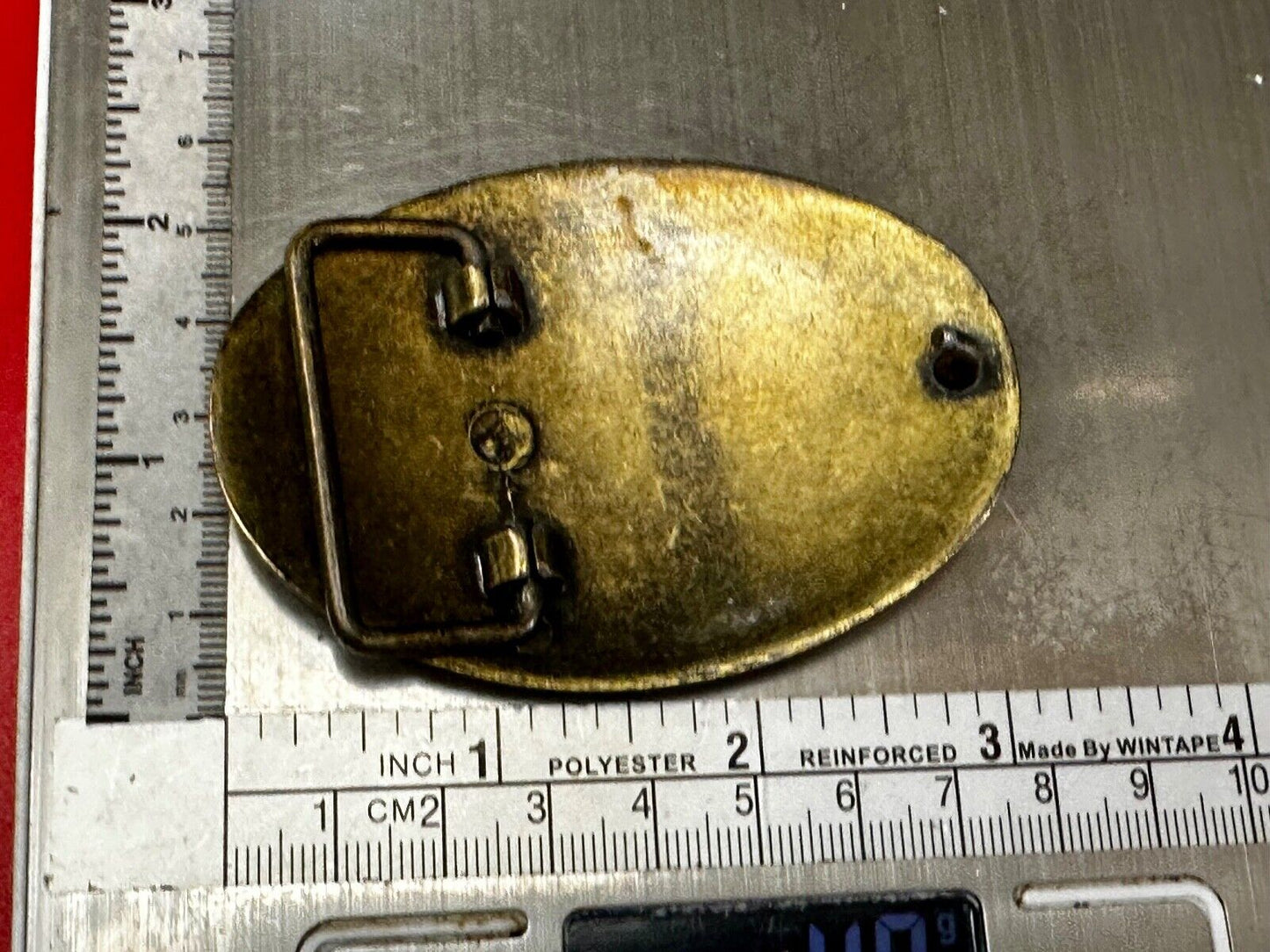 Vintage black and gold tone western flower floral theme cowboys belt buckle