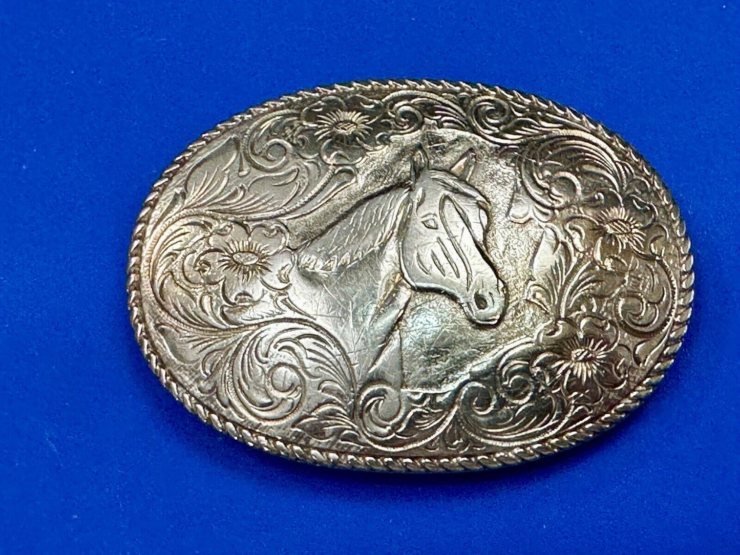 Beautiful large ornate HORSE BUST HEAD on engraved flower swirl belt buckle