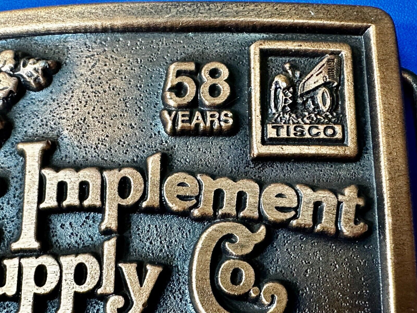 TISCO 58 Years Tractor Implement Supply Co. Since 1937 Belt Buckle by Spec-Cast