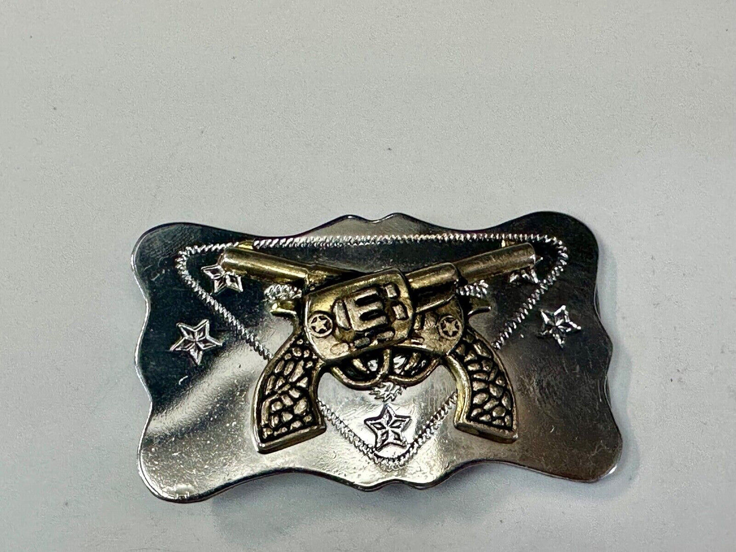 Vintage Cowboys Six Shooter gun's crossed western two tone belt buckle