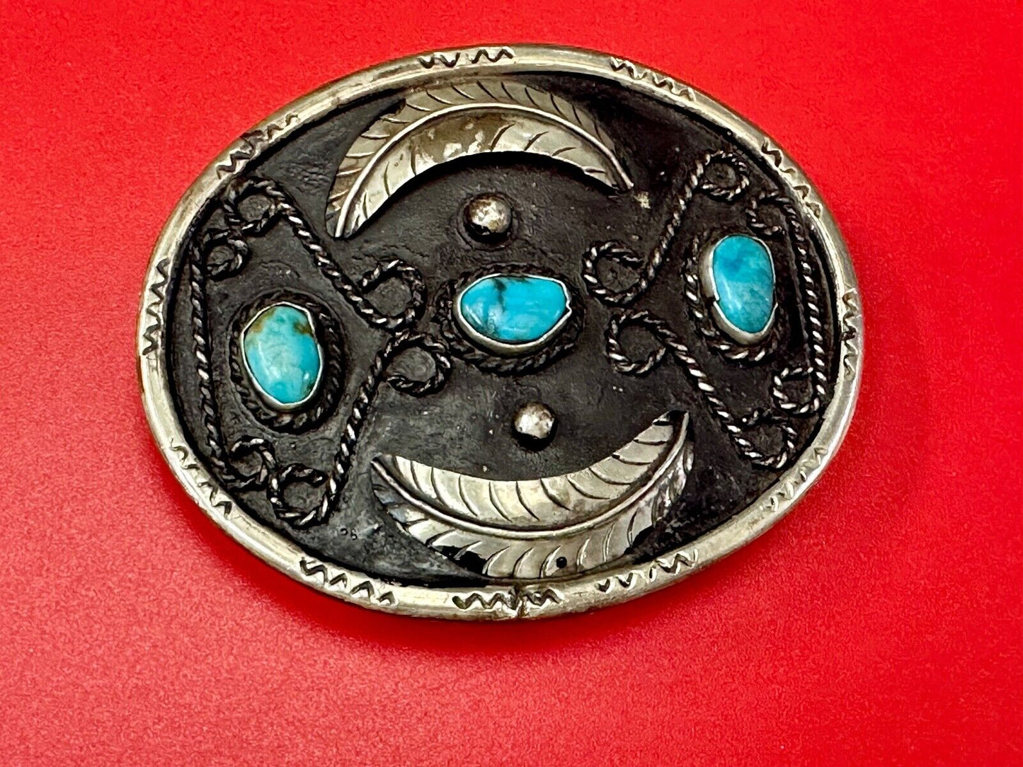 Turquoise stones raised feathers vintage belt buckle marked Sterling 0925 Mexico