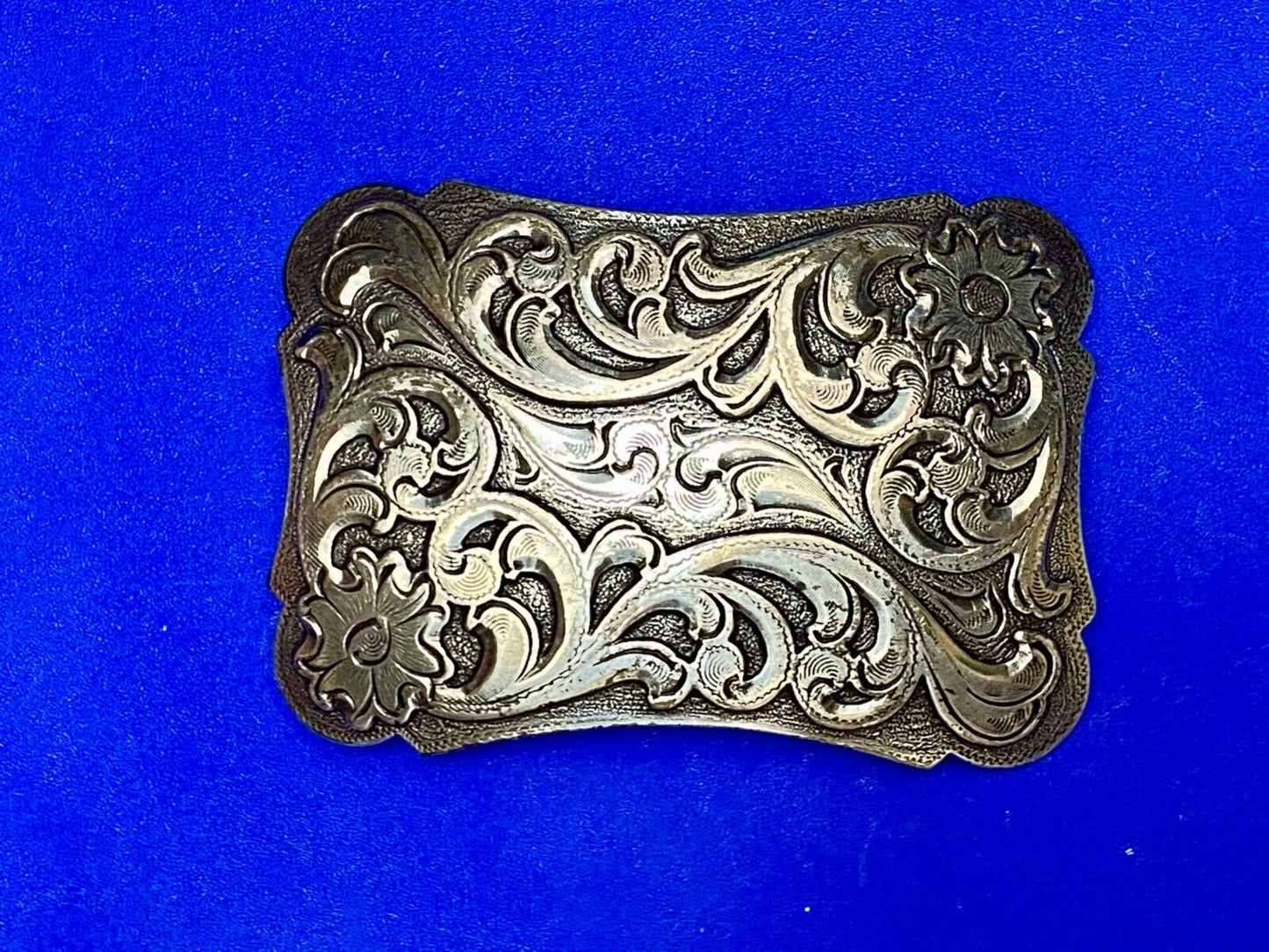 Thick flower swirl silver color western belt buckle
