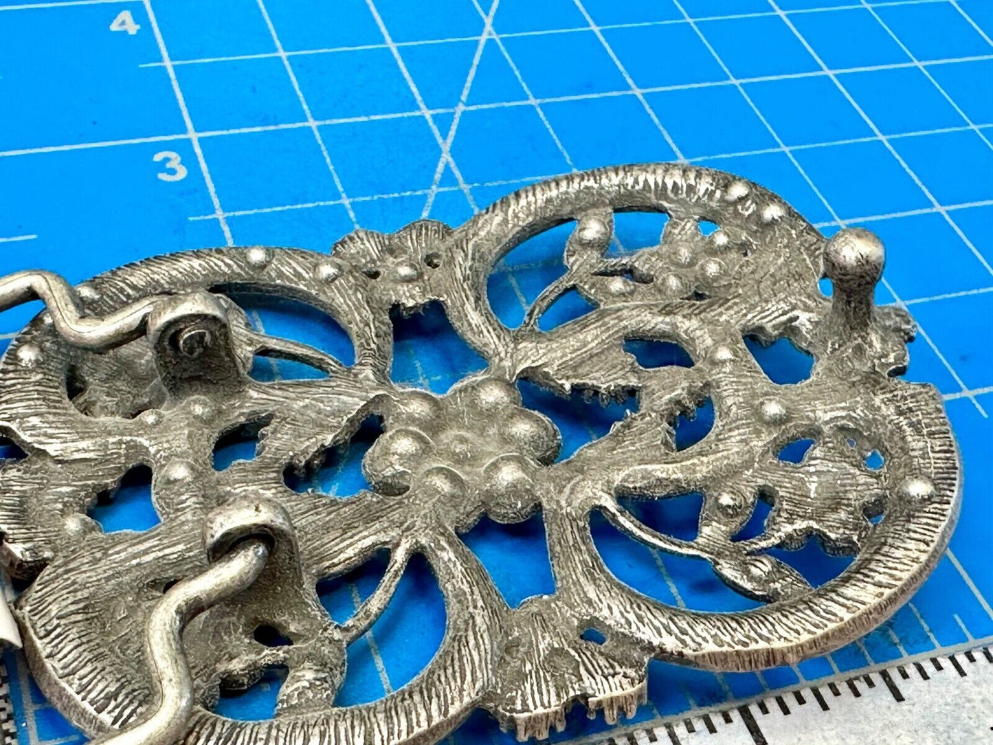 Black rhinestone accented metal flower pattern NOS Funky Junque belt buckle