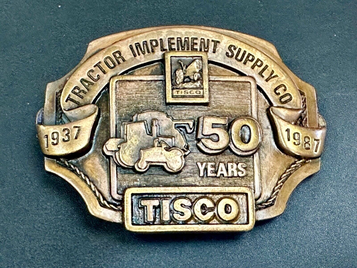 Tisco 50 year celebration Tractor farm supply company promo 1986 belt buckle