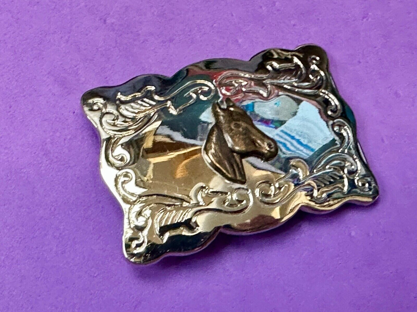 Vintage horse head centered on western rectangular two tone belt buckle