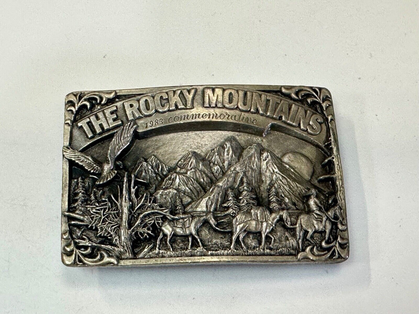 THE ROCKY MOUNTAINS** COMMEMORATIVE BELT BUCKLE VINTAGE 1983 BELT BUCKLE