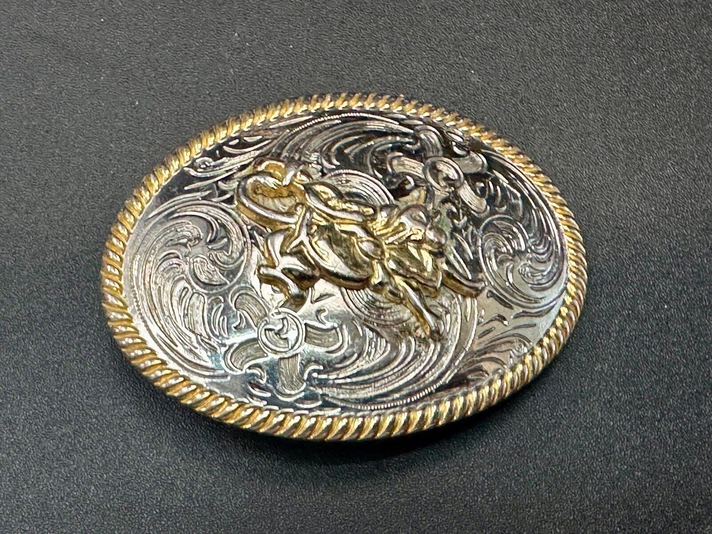 2.5" wide Two tone Vintage western rodeo cowboy belt buckle.