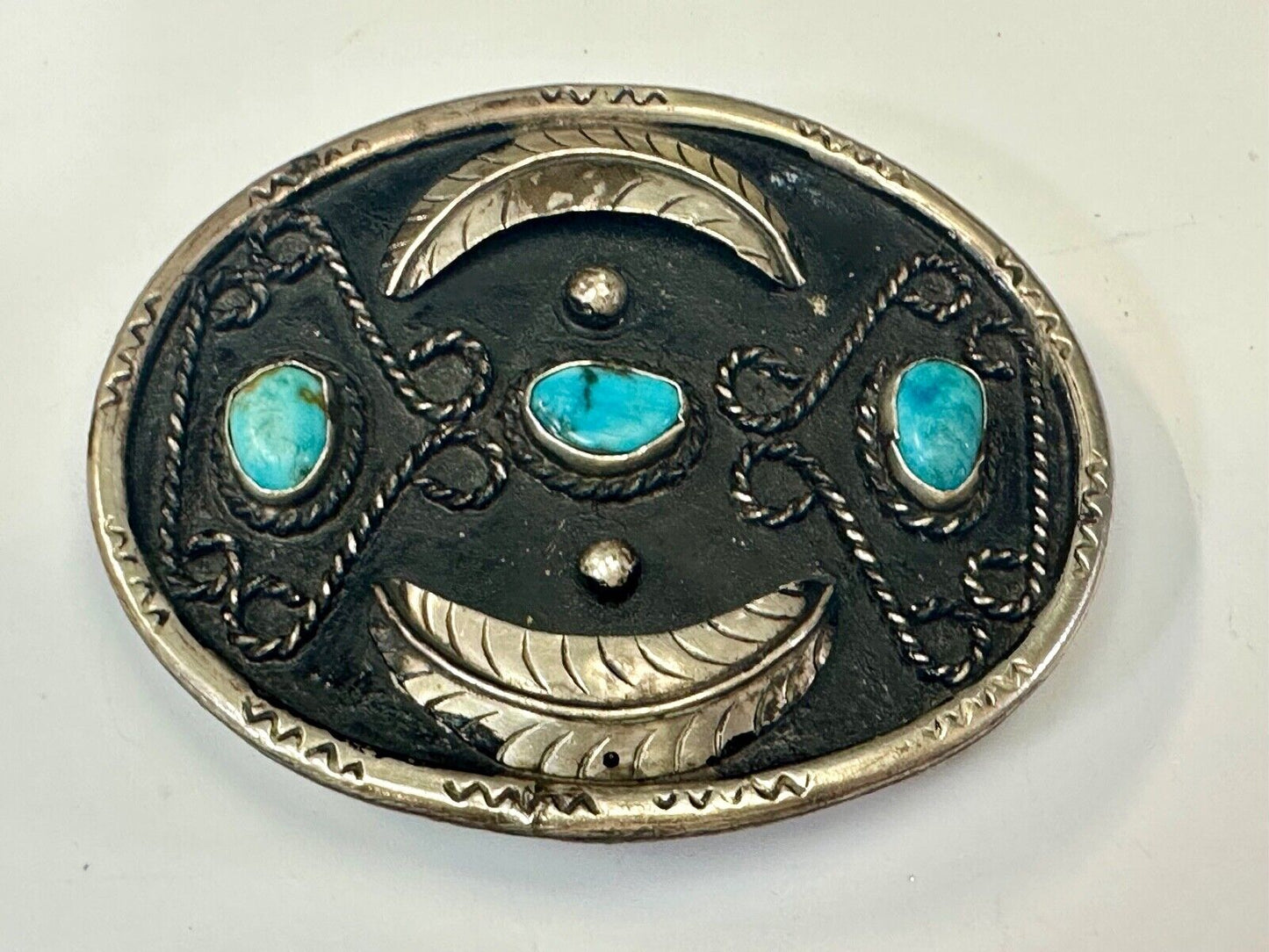 Turquoise stones raised feathers vintage belt buckle marked Sterling 0925 Mexico