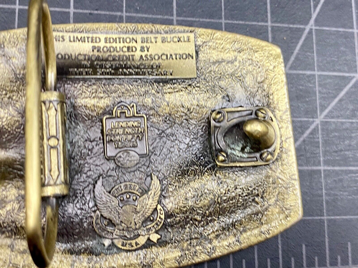 The First PCA loan Production Credit Assn. The Great American Belt Buckle Co