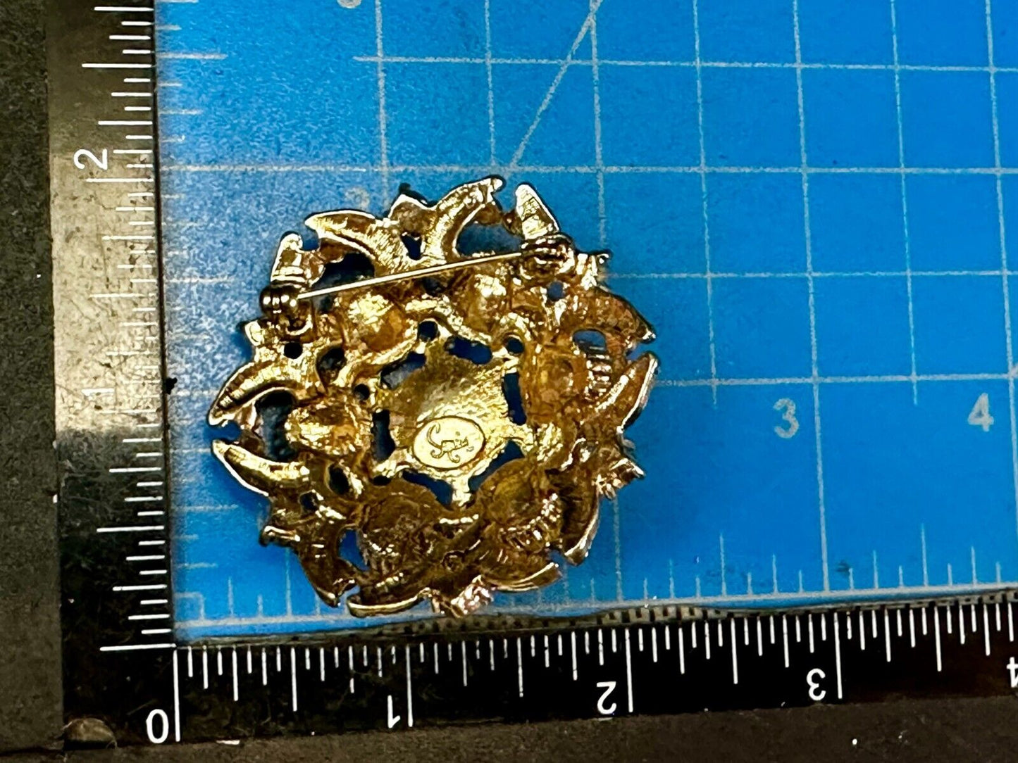 Beautiful Round Flower Shaped Blue Green Rhinestone Brooch Pin Signed by SQUIRE