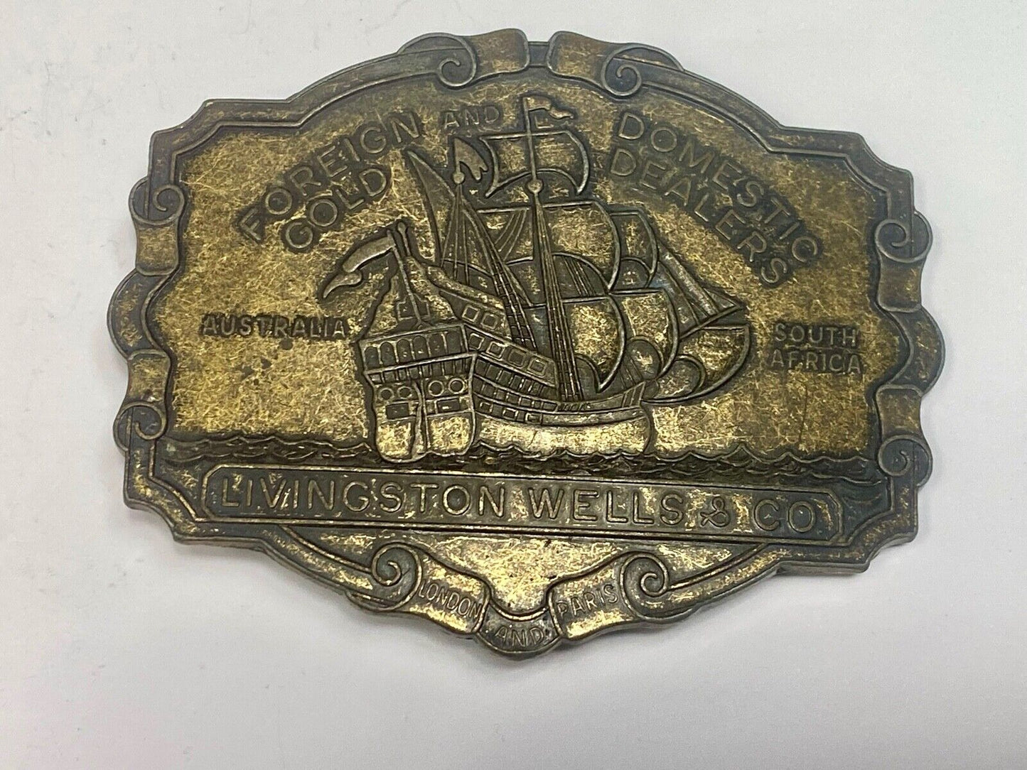 VINTAGE ANTIQUE METAL BELT BUCKLE- Livingston Wells & Co Sailboat Ship