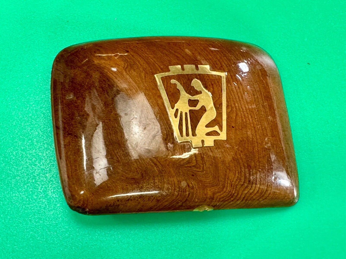Artisan wooden glossy wood belt buckle with gold color artist scene?