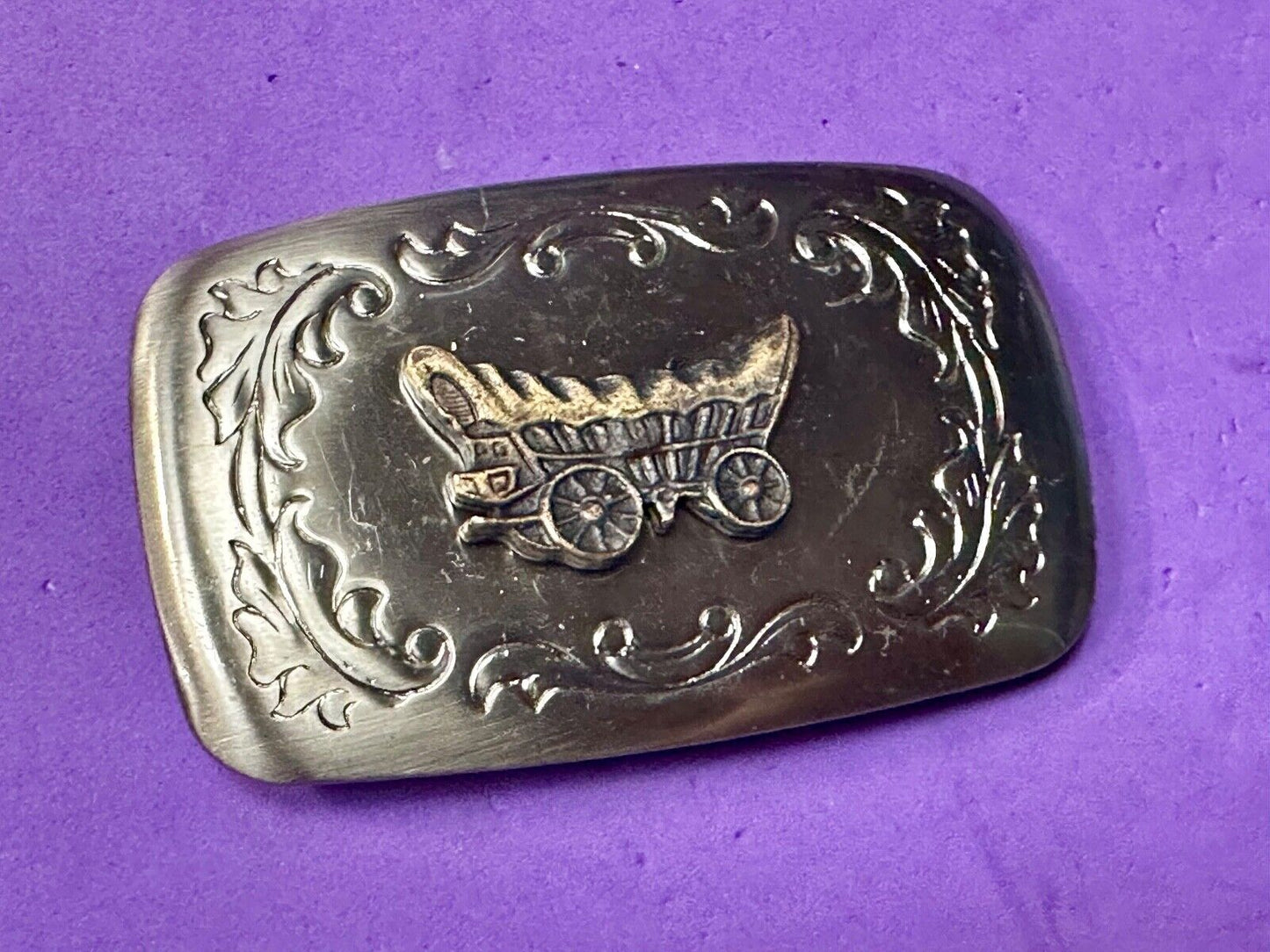 Vintage covered wagon two tone western mixed metal belt buckle