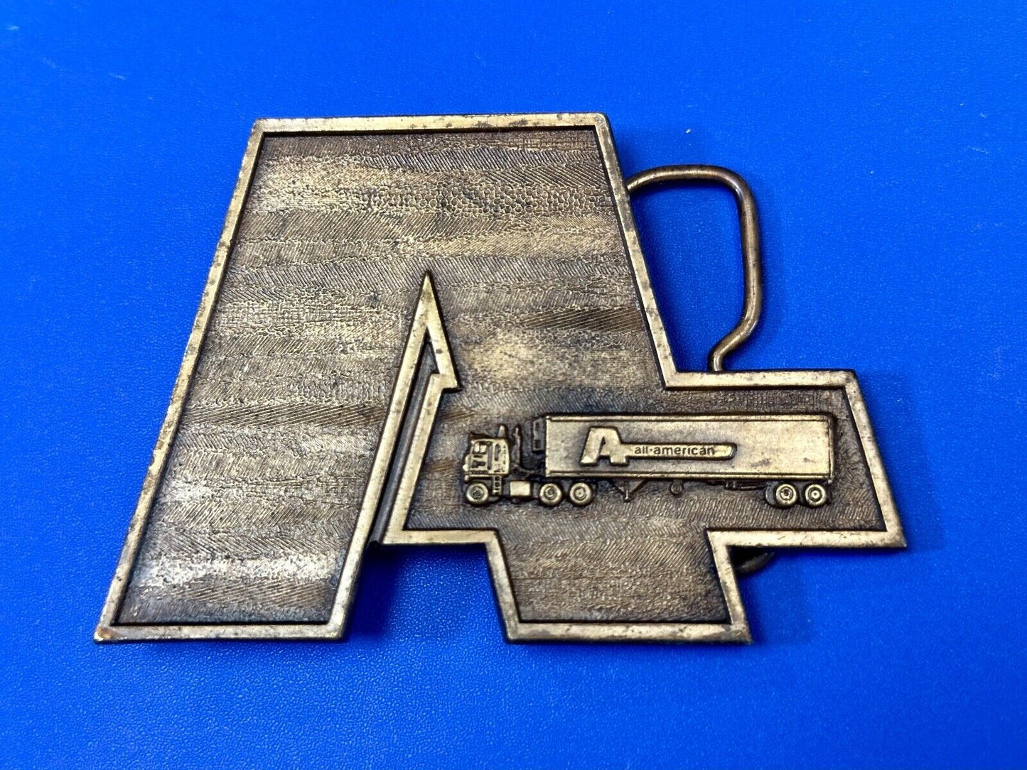 VINTAGE 1977 ALL AMERICAN DRIVERS TRUCK & TRANSPORT COMPANY BELT BUCKLE