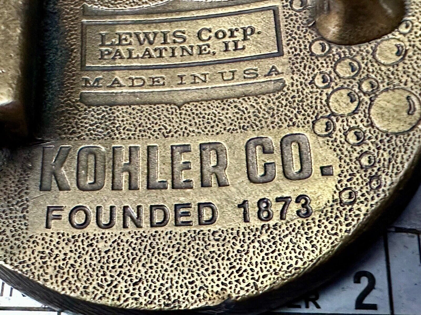 The Bold Look of Kohler - Vintage 1977 Lewis round Limited Edition belt buckle