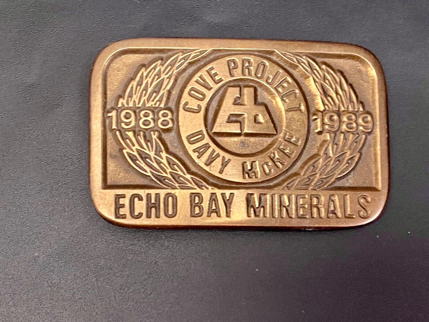 Vintage 1989 **ECHO BAY MINERALS** COVE PROJECT MINING SOLID BRASS BUCKLE