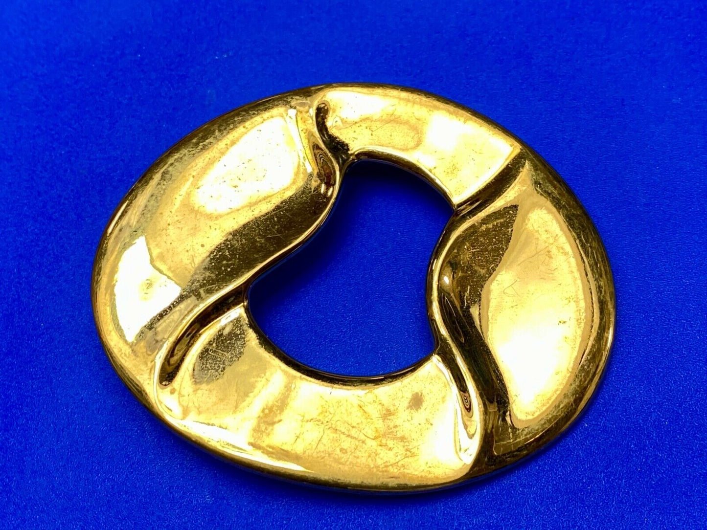 Artist Ginnie Johansen signed gold color abstract oval belt scarf slide