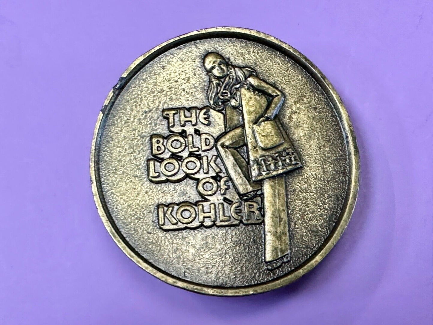 The Bold Look of Kohler Vintage 1977 Lewis round Limited Edition belt buckle