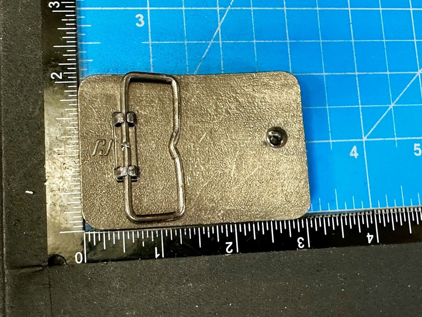 Austin Texas Distributing and Manufacturing 1982 Advertisement Promo Belt Buckle