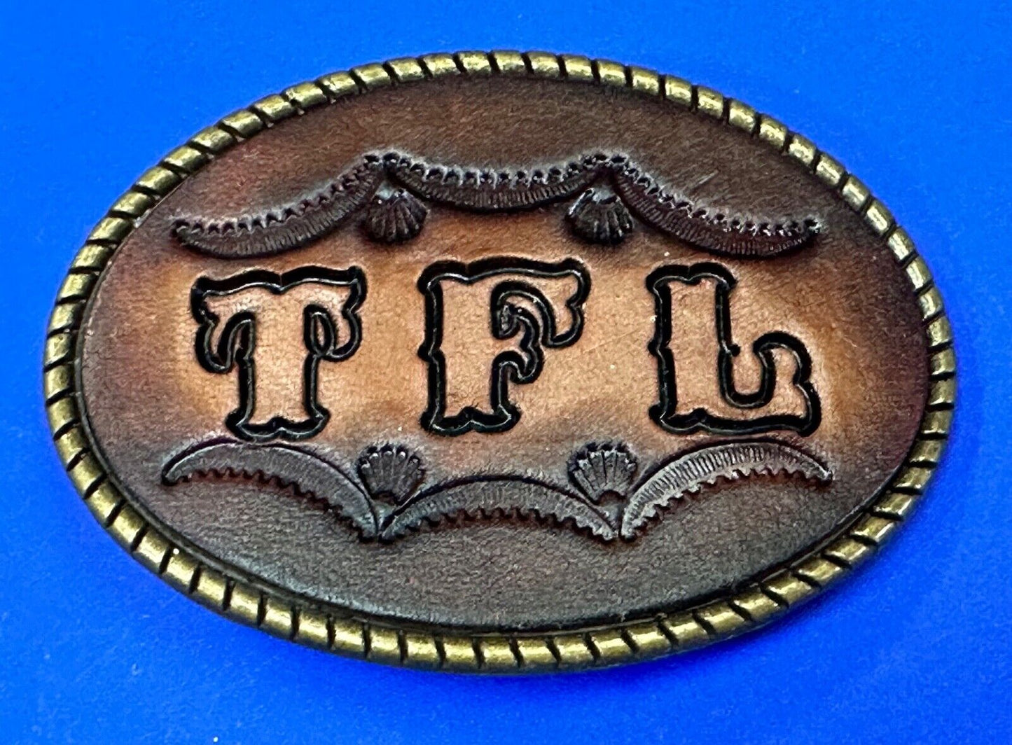 TFL. vintage western initials letters on leather belt buckle