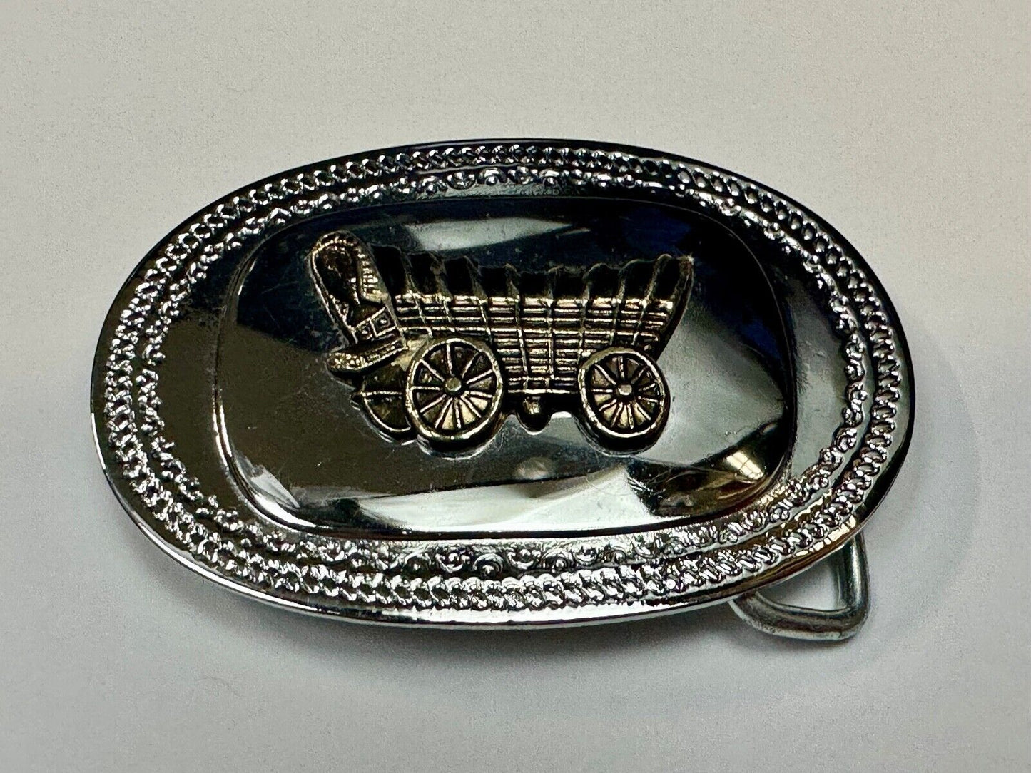Vintage Covered Wagon on reflective oval two tone western belt buckle