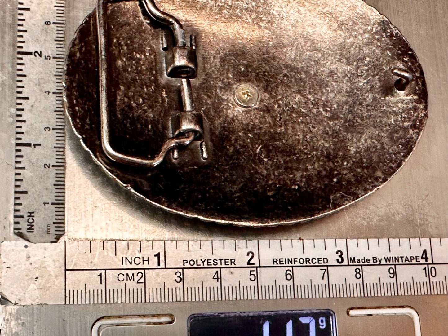 The Lone Star Centered In Oval Flower Swirl Silver Tone Belt Buckle