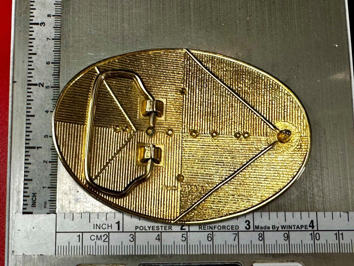 Vintage black and gold tone western flower floral theme cowboys belt buckle