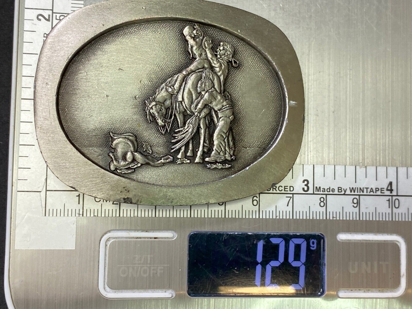 Teaching Future Rodeo Cowboys Grooming Belt Buckle Art Unique And Unknown To Me!