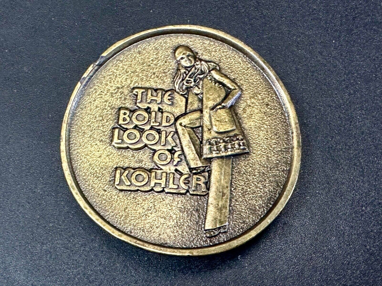 The Bold Look of Kohler Vintage 1977 Lewis round Limited Edition belt buckle