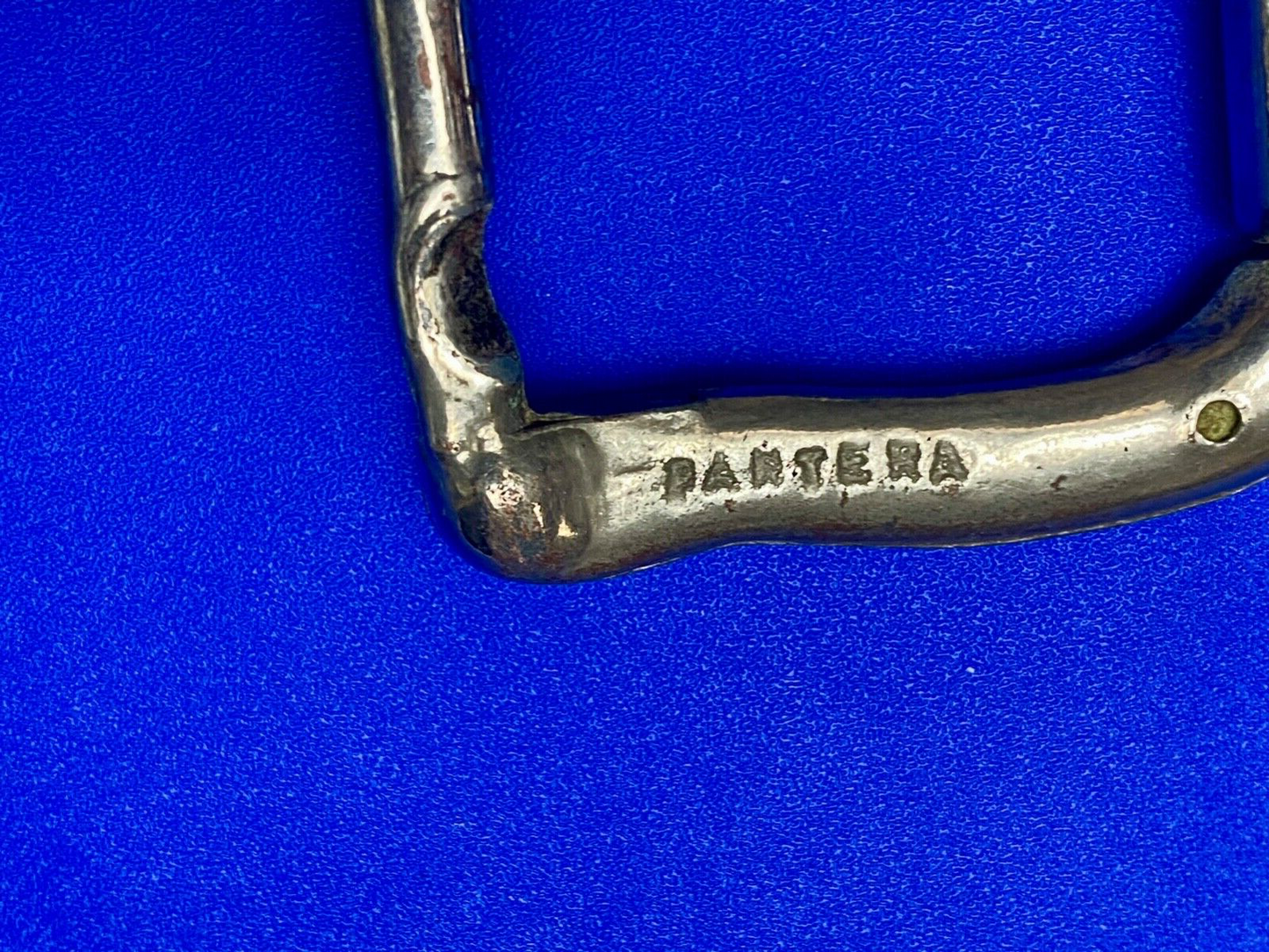 Vintage dual arm silver toned belt buckle stamped pantera 1610