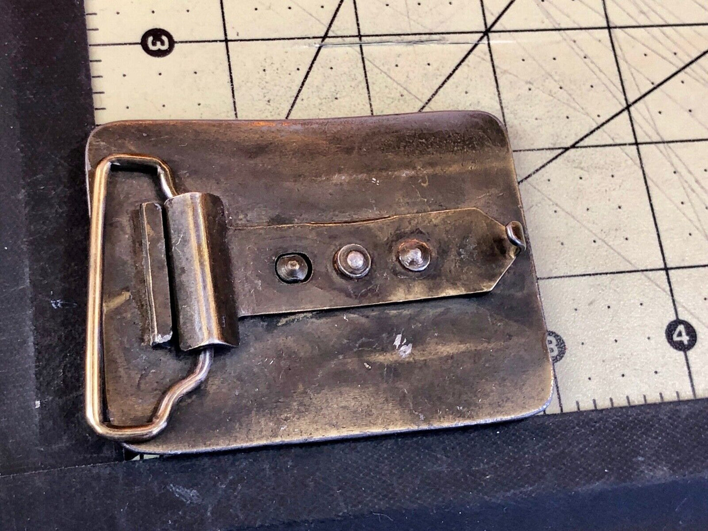 Vintage advertising Rhizo kote seal coating company belt buckle