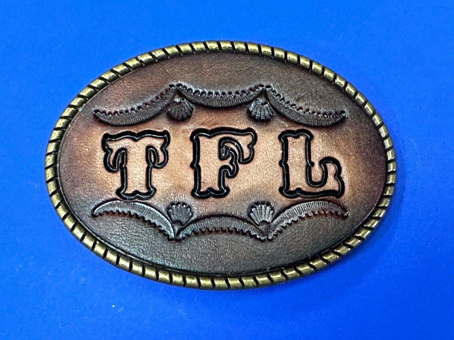 TFL. vintage western initials letters on leather belt buckle