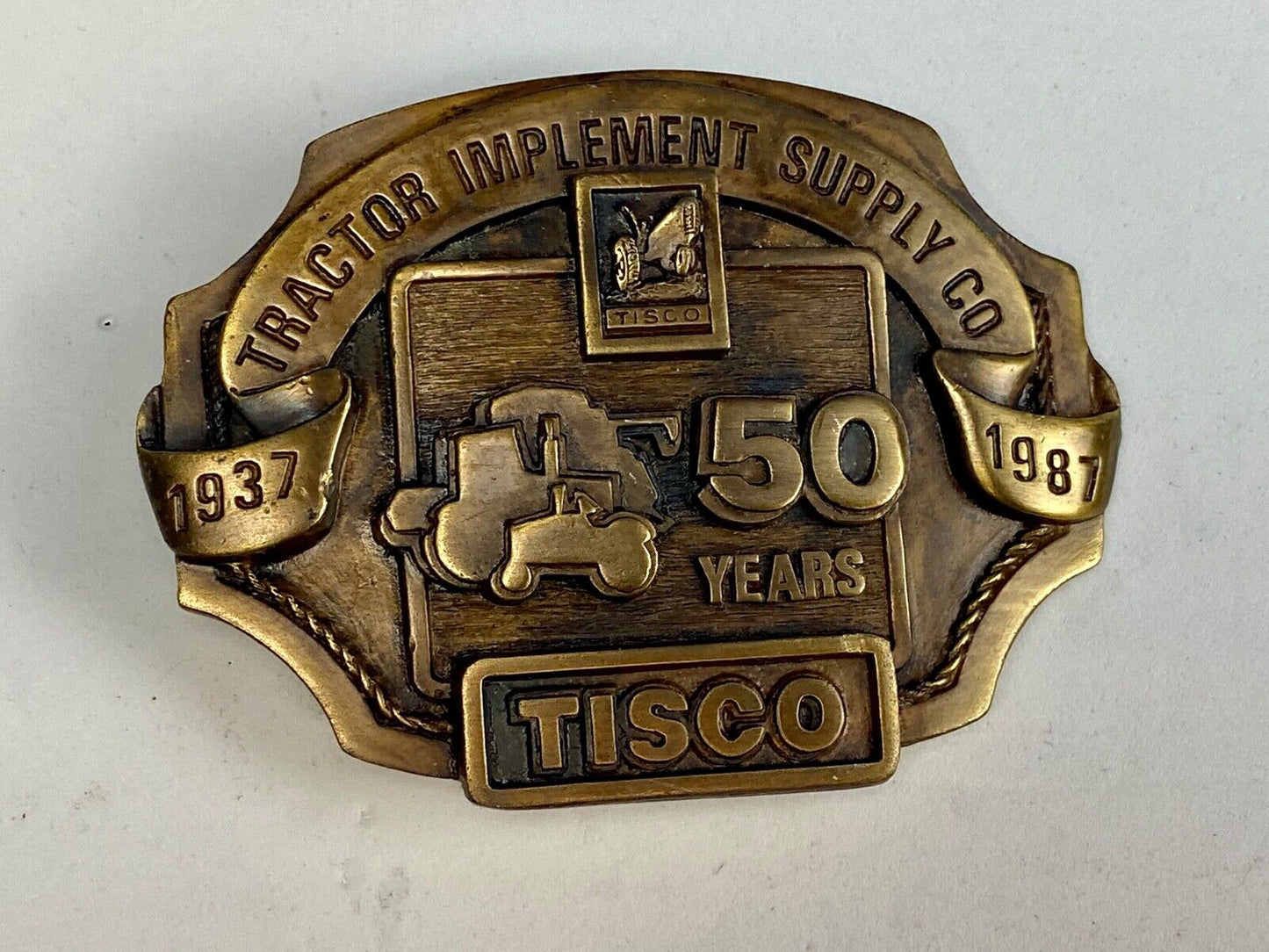Vintage 1986 Tisco Tractor 50 years Anniversary Belt Buckle by Siskiyou