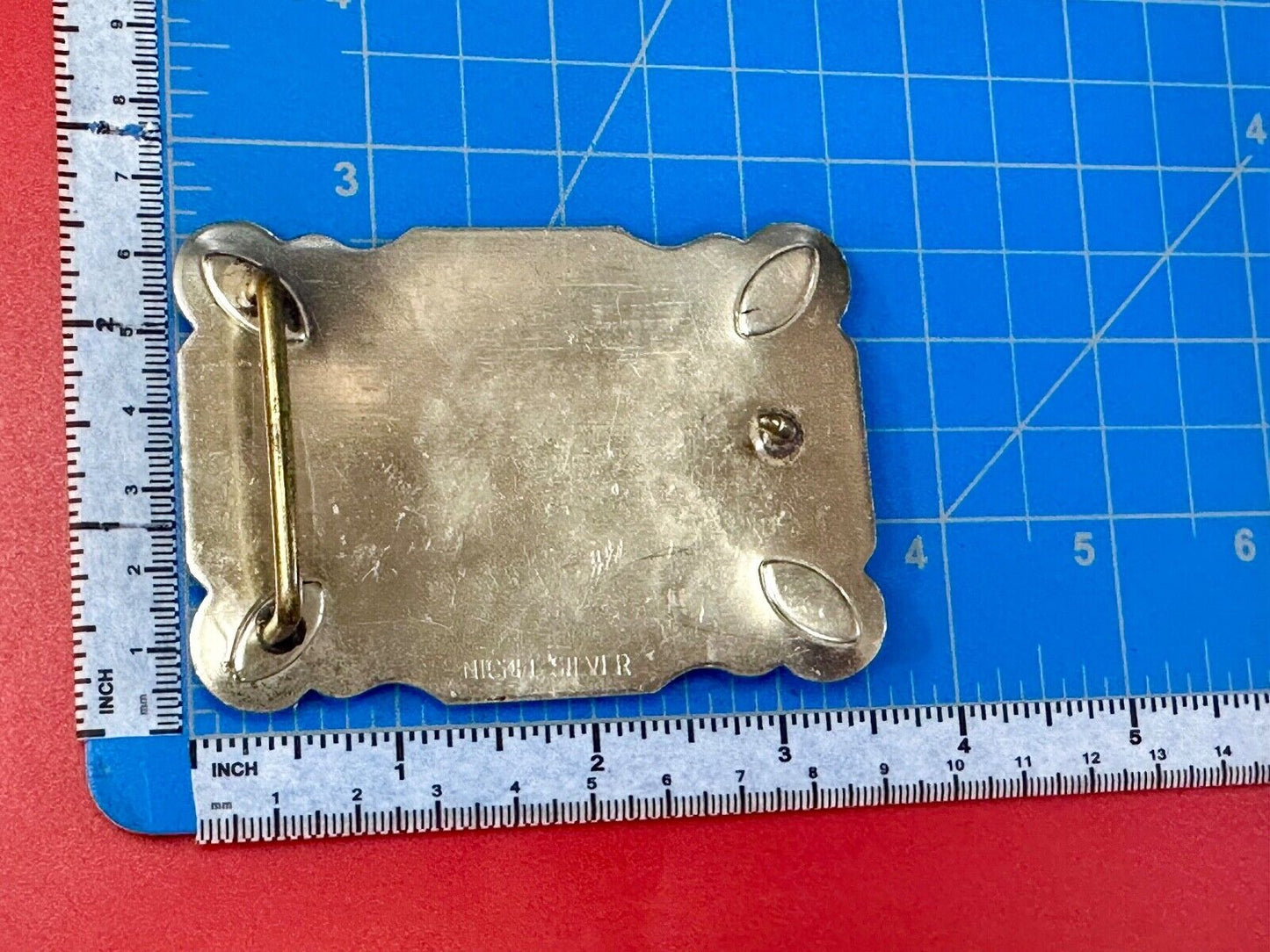 The Longhorn cow steer western nickel silver belt buckle with turquoise accents