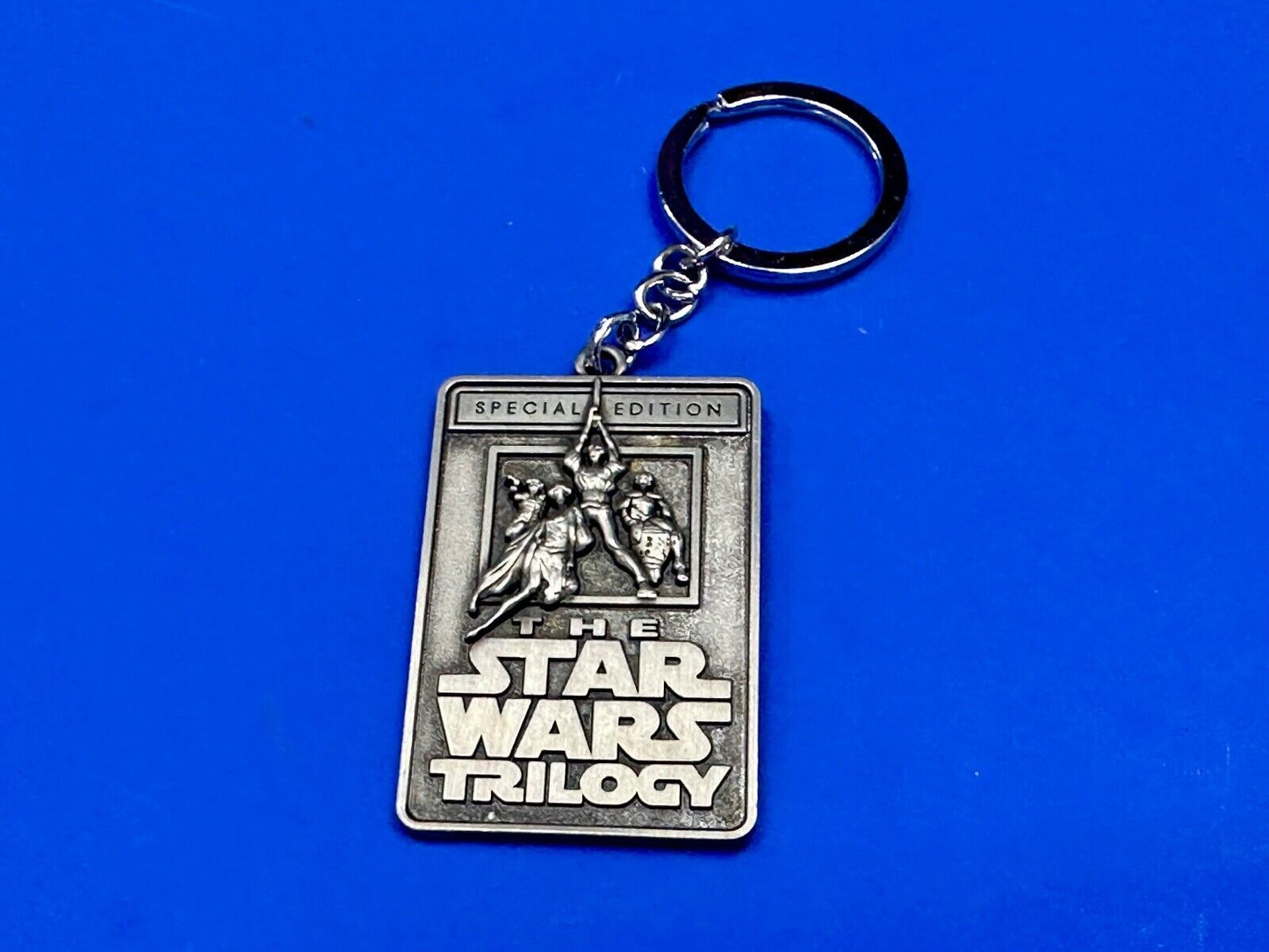 The Star Wars Trilogy Logo Emblem NOS Keychain!
