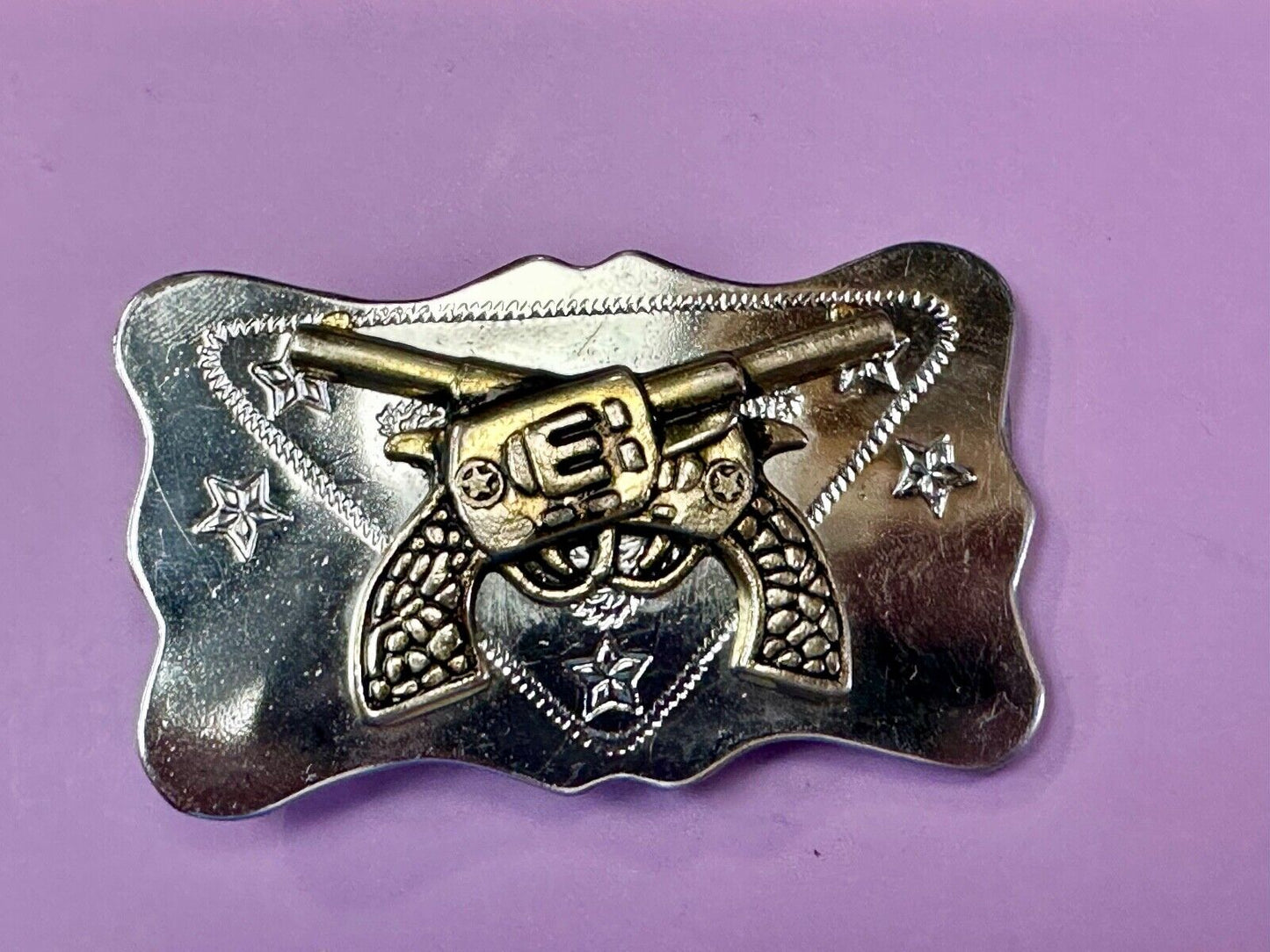 Vintage Cowboys Six Shooter gun's crossed western two tone belt buckle