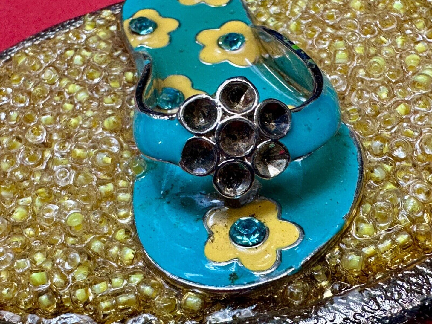 unique flip flop on sand - beach girls artisan belt buckle - missing stones?