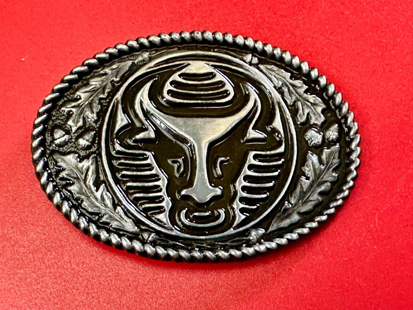 The Longhorn cow steer with nose ring Vintage rope boarder belt buckle