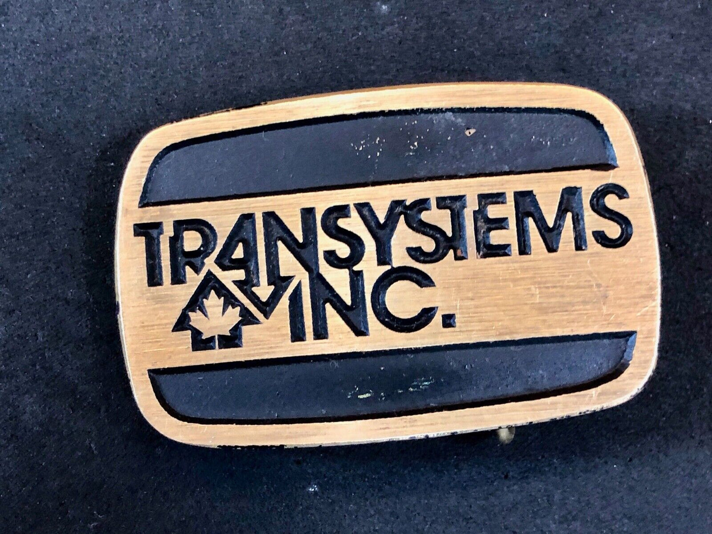 transystems inc Canada Promo belt buckle -a Construction engineering company