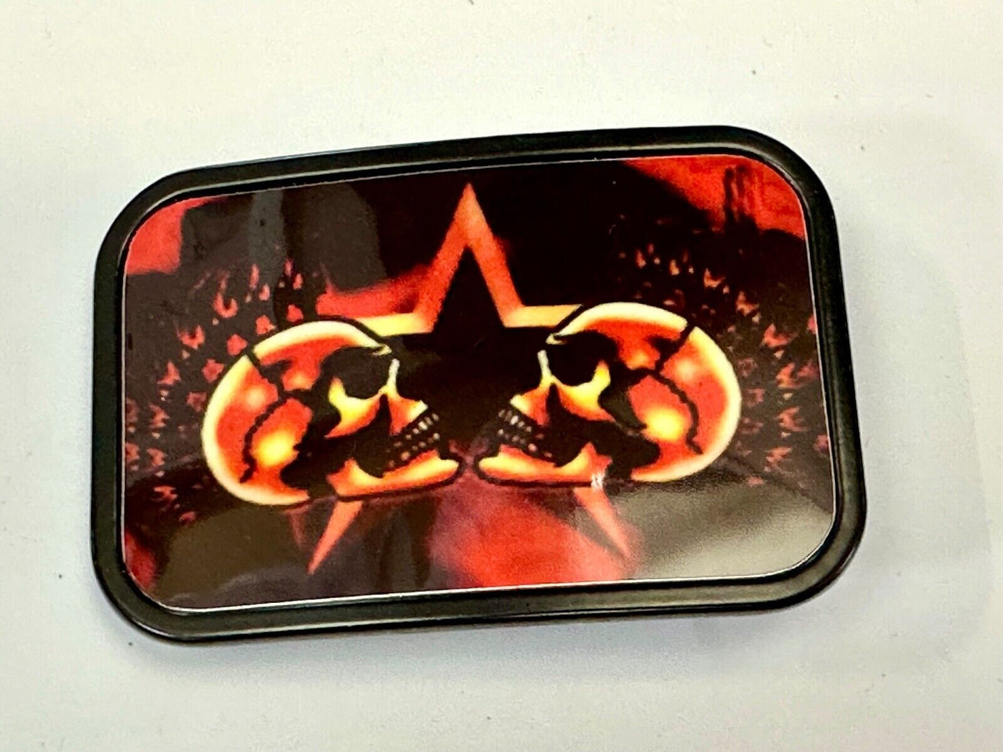Two Skulls around star picture - black & red color rectangular belt buckle
