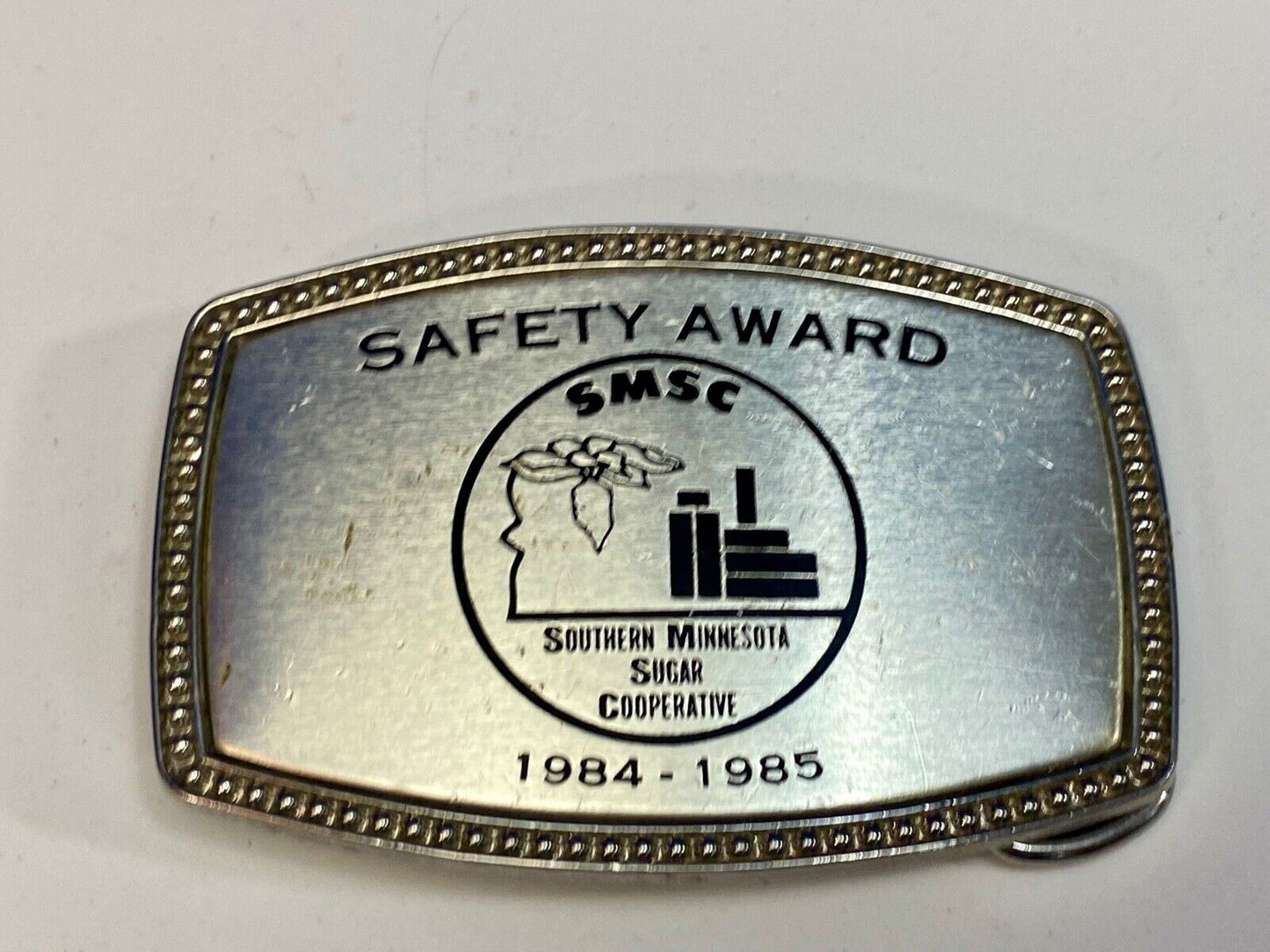 1985 - Smsc Southern Mn Sugar Cooperative Safety Award Belt Buckle By Alumaline
