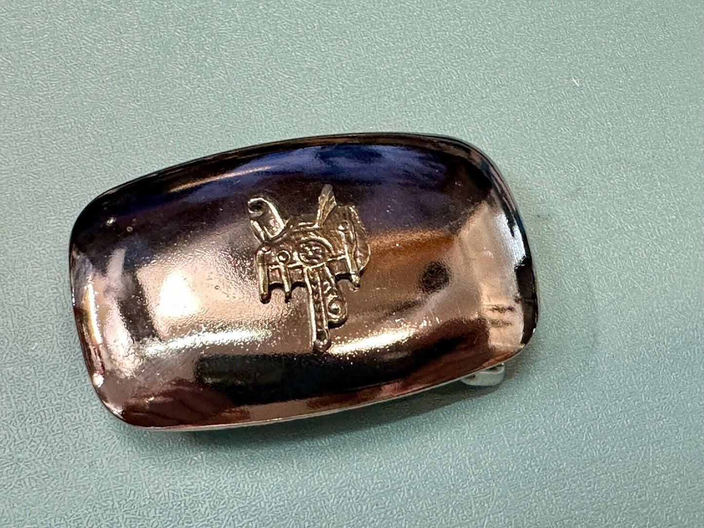 Beautiful two tone Horse Saddle on reflective western belt buckle