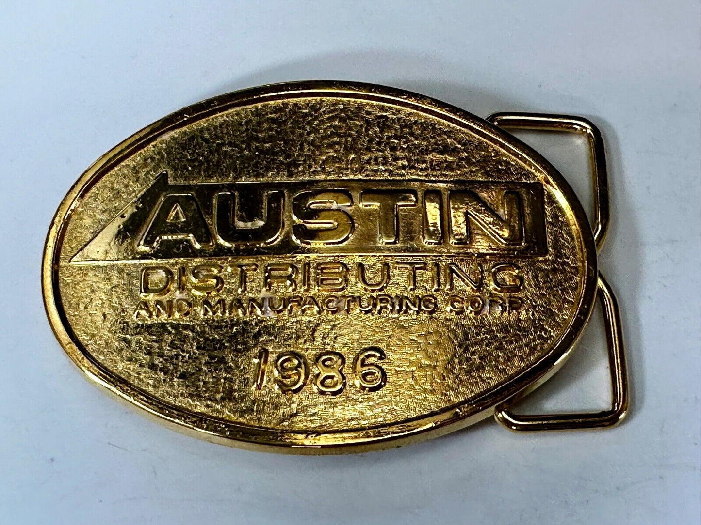 Austin Distributing and Manufacturing Corp VTG 1986 Advertisement RJ Belt Buckle
