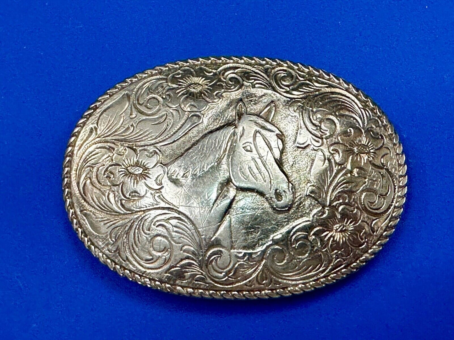 Beautiful large ornate HORSE BUST HEAD on engraved flower swirl belt buckle