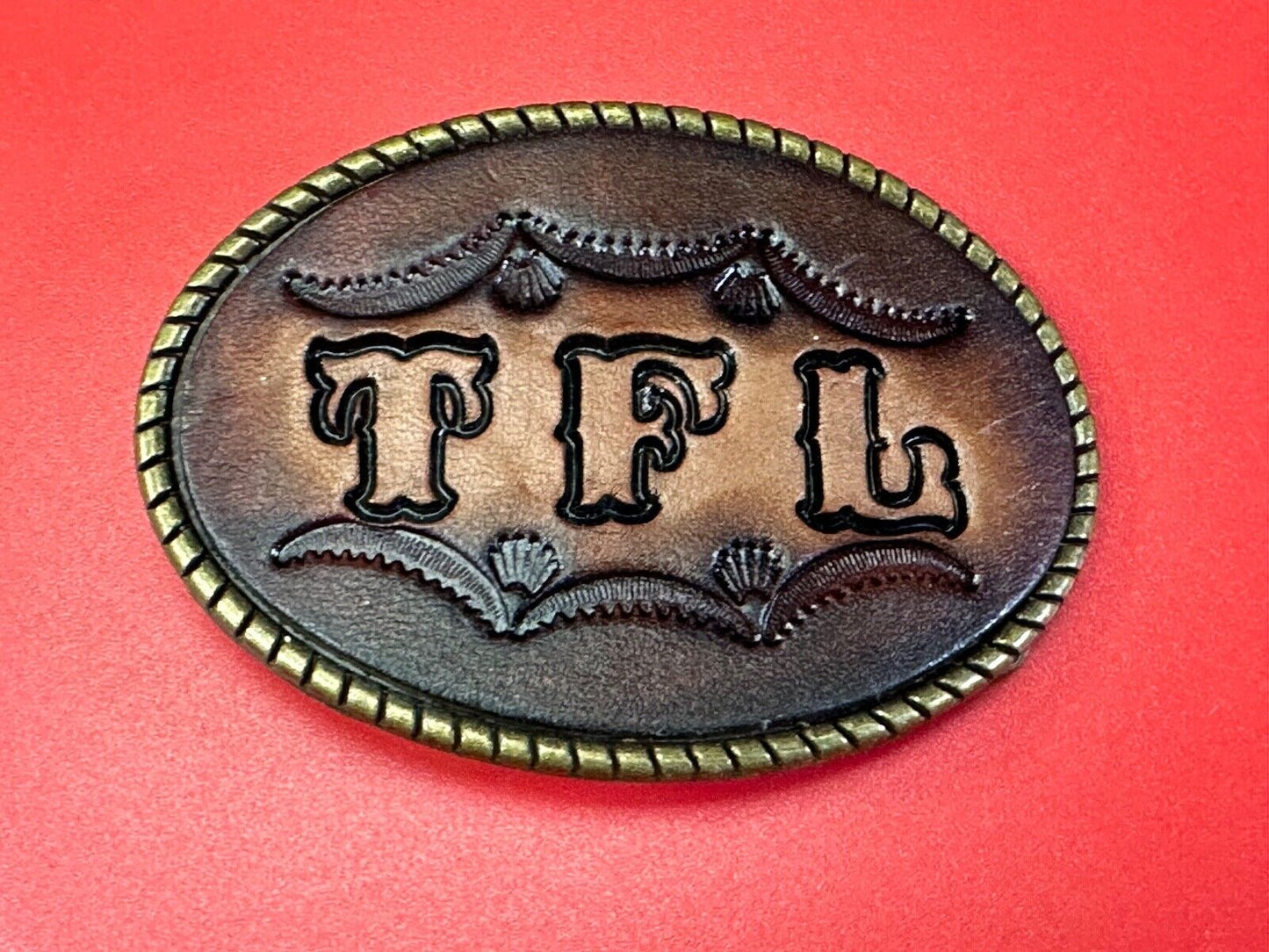 TFL. vintage western initials letters on leather belt buckle