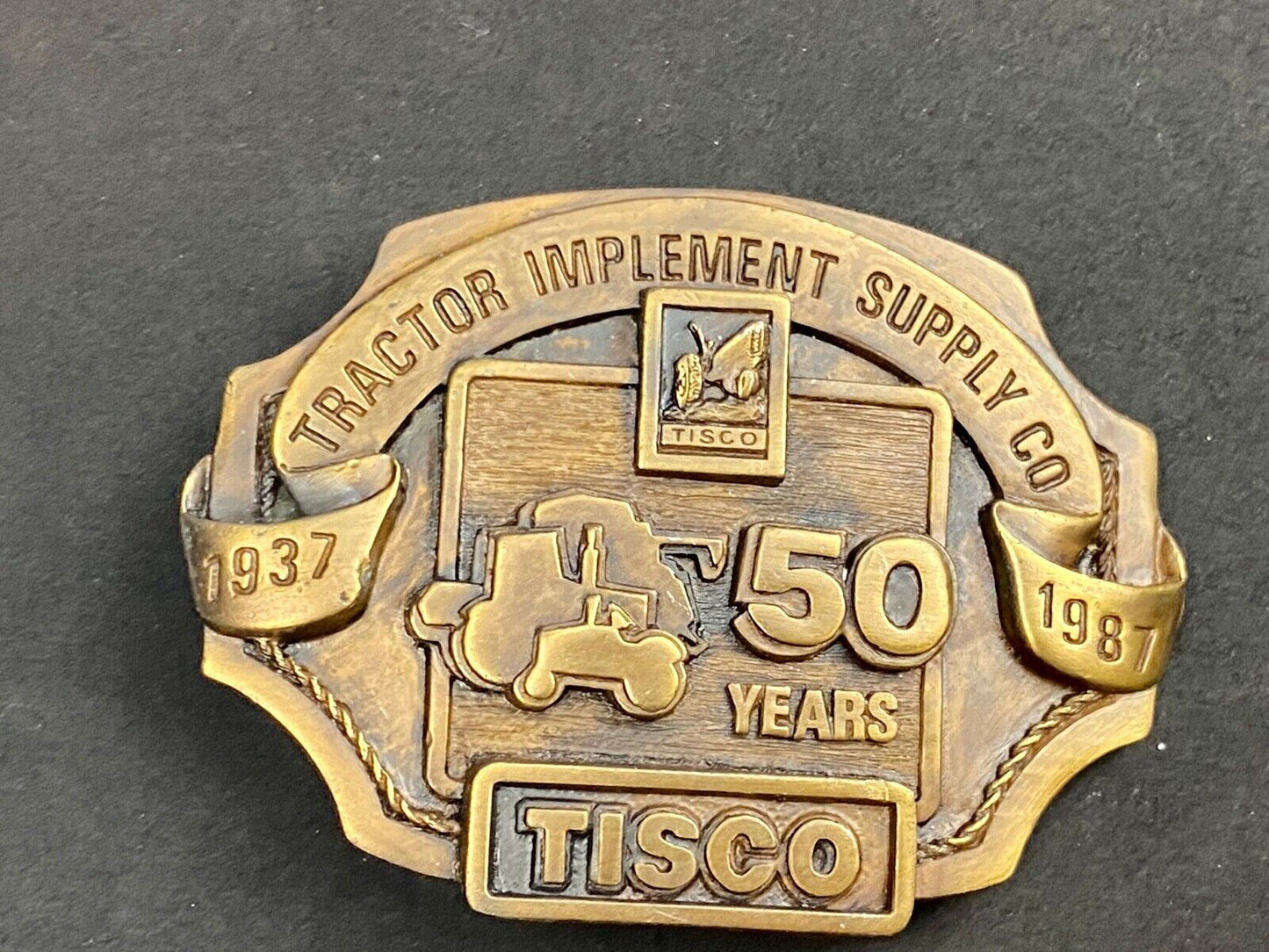 Vintage 1986 Tisco Tractor 50 years Anniversary Belt Buckle by Siskiyou