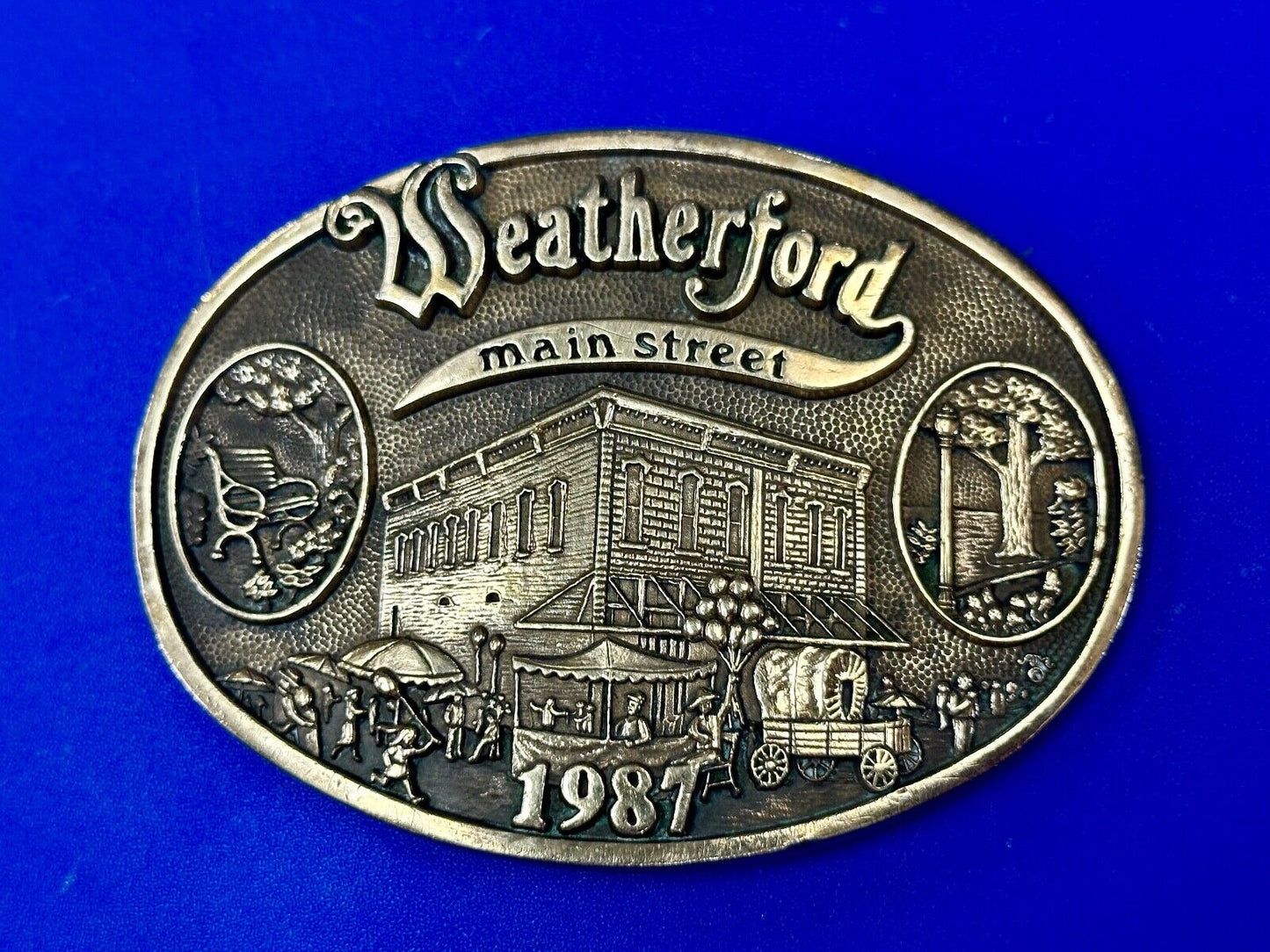 Texas Weatherford Main Street - vintage 1987 LIMITED ADM solid brass belt buckle