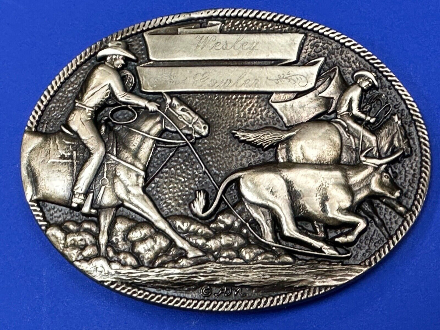 The Cattle Drive Western Rodeo Cowboys engraved award ribbon scroll belt buckle